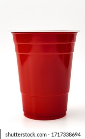 Partying, American Drinking Games And Party Supplies Concept With Red Plastic Cup Isolated On White Background With Clipping Path Cutout