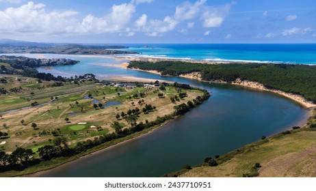 The Pas River, its mouth, Liencres Dunes Natural Park, and the Atlantic Ocean seen from the Abra del Pas viewpoint in Liencres, Cantabria, Spain.
