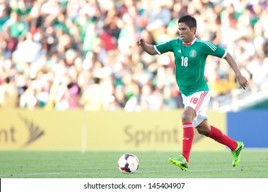 PASADENA, CA - JULY 7: Juan Carlos Valenzuela #18 Of Mexico During The 2013 CONCACAF Gold Cup Game Between Mexico And Panama On July 7, 2013 At The Rose Bowl In Pasadena, Ca.