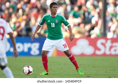 PASADENA, CA - JULY 7: Juan Carlos Valenzuela #18 Of Mexico During The 2013 CONCACAF Gold Cup Game Between Mexico And Panama On July 7, 2013 At The Rose Bowl In Pasadena, Ca.