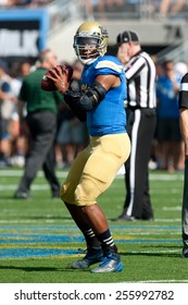 PASADENA, CA. - OCT 11: UCLA Bruins QB Brett Hundley In Action During The UCLA Football Game On October 11th 2014 In Pasadena, California.