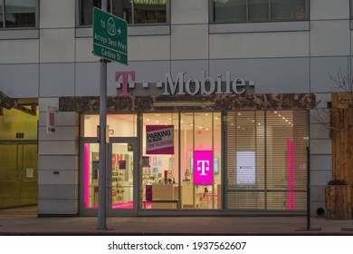 Pasadena, CA, USA - March 16, 2021: This Dusk Image Shows  A T Mobile Store In The City Of Pasadena.