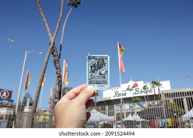 Pasadena, California, United States - 10-25-2021: A View Of A Hand Holding An Admission Ticket To The Rose Bowl Flea Market.