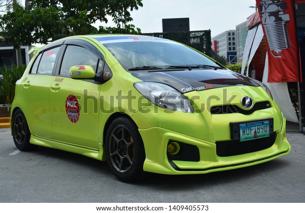 PASAY, PH - MAY 26: Lime
green Toyota Yaris at Toyota car fest on May 26, 2019 in Pasay,
Philippines.