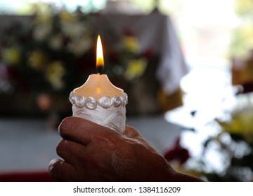 
Paschal Candle In Adult Hand