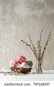 Paschal still life with Pysanky and pussy willow branches. Easter eggs decorated with wax resist technique, traditional for Eastern European cultures