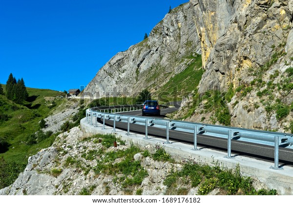 Pass road with crash barriers, La Clusaz, Bornes
Aravis, Haute-Savoie,
France