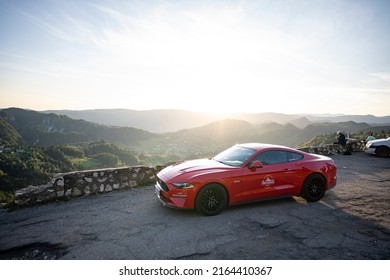 Rucăr-Bran Pass, Romania - September 20, 2020: Driving Ford Mustang GT Through Romanian Mountain Passes