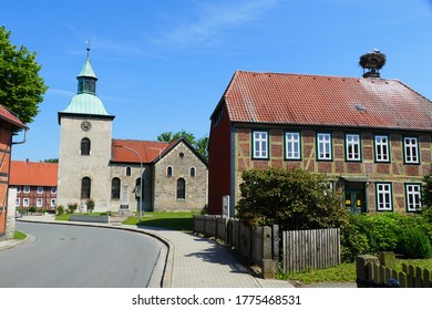 Pass Through The Village Grafhorst With The Lutheran Elizabeth Church And A House With A Storks Nest On The Roof, District Helmstedt, Lower Saxony, Germany