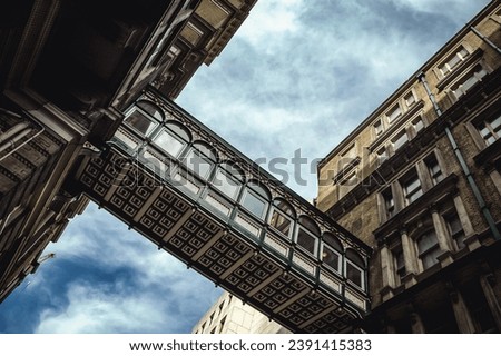 Passage between two building on Villiers Street, Westminster area of London, UK
