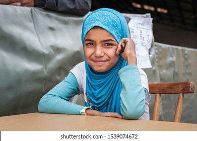 Passau, Germany - August 1st, 2015: Syrian refugee girl at a camp in Passau, Germany. 