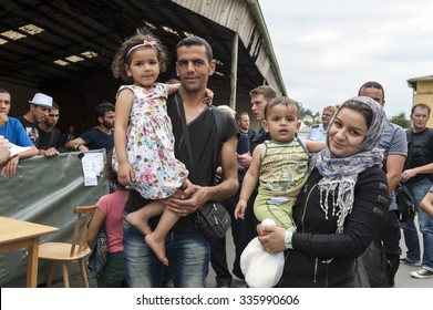 Passau, Germany - August 1st, 2015: Syrian refugee family at a camp in Passau, Germany