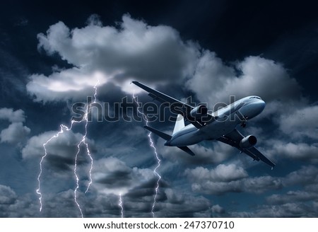 Passenger aeroplane yielding turbulent thunderstorm and lightnings