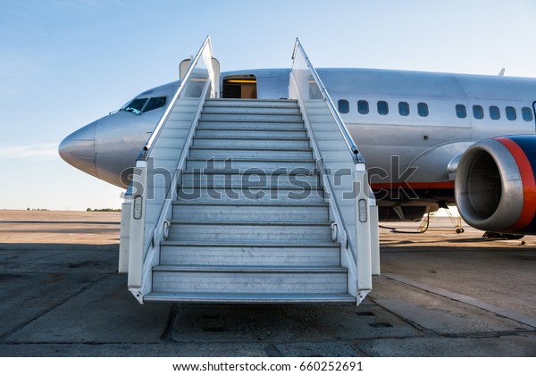 Passenger Aircraft Boarding Ramp On Airport Stock Photo (edit Now 