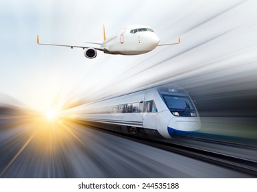 passenger aircraft flying over the high-speed train - Shutterstock ID 244535188