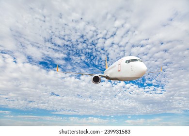 Passenger Airplane In The Clouds. Travel By Air Transport 