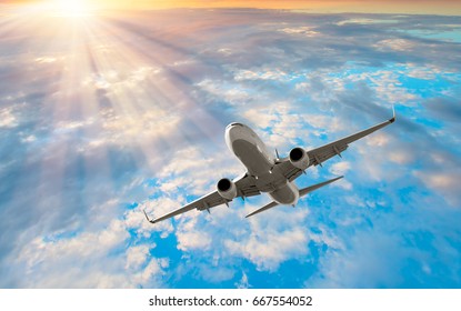 Passenger airplane in the clouds. travel by air transport