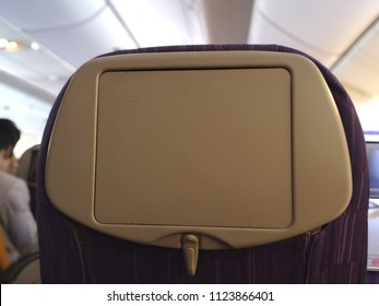 Passenger Airplane Seat, Back View, Isolated, Blurred​