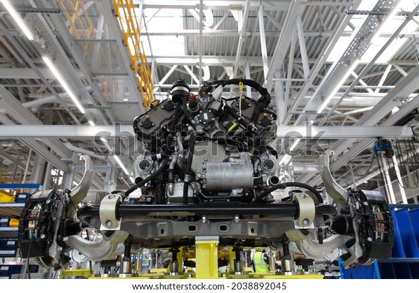 Passenger car manufacturing central assembly line.\
Automobile plant.