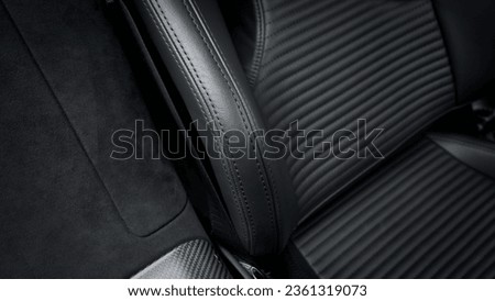 Passenger car seat in black showing the seat bolster