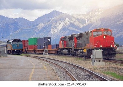 Passenger And Freight Container Train In Jasper. Alberta. Canada.