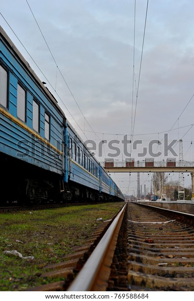 Passenger and freight train.\
Passenger diesel train traveling speed railway wagons journey\
light