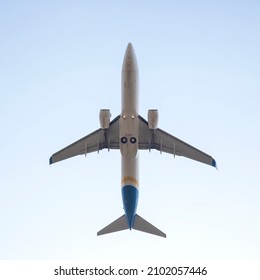 Passenger Jet Plane Flying In The Sky