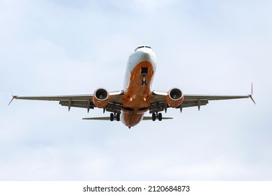 Passenger Jet Plane Flying In The Sky