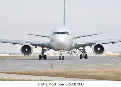 Passenger Jet Plane On The Runway In The Airport (front View)