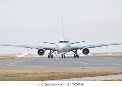 Passenger Jet Plane On The Runway In The Airport (front View)