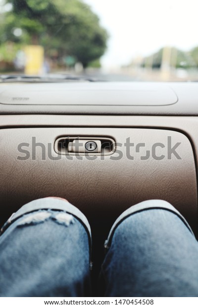 Passenger knee,\
he sitting on the co-driver\
seat.