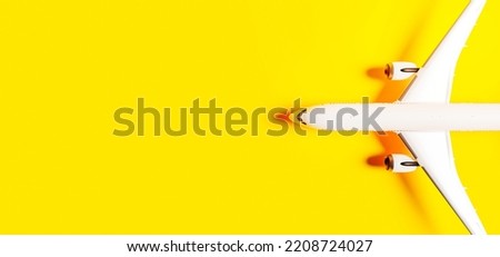 passenger plane banner seen from above with yellow background. 3d render