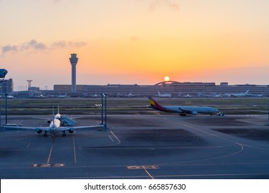 passenger plane  take-off runway from airport at sunrise