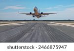 A passenger plane taking off airport - Tire tracks of airplane tires left marks on the runway 