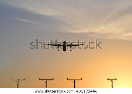 Similar – Flugzeug im Sonnenuntergang