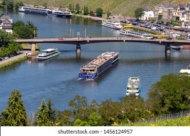 Passenger And River Cruise Ships On The Moselle River Near Bernkastel-Kues