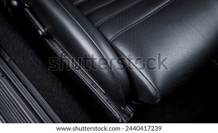 Passenger seat bottom in a car