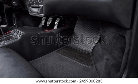 Passenger seat foot well in a car