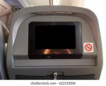 Passenger Seat Of Plane With Blank Empty Black Monitor Screen, And No Smoking Allowed Sign