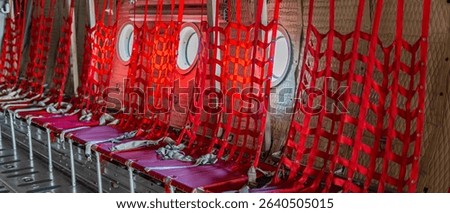 Passenger seats in military transport aircraft, military transport aircraft, and air force fighter aircraft. c130