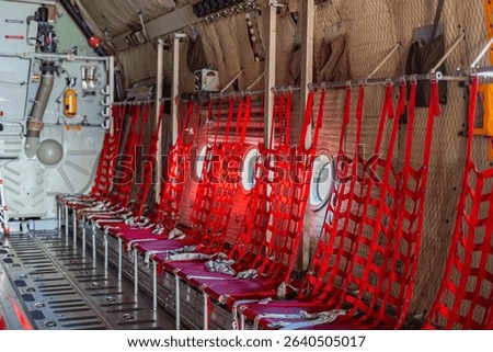 Passenger seats in military transport aircraft, military transport aircraft, and air force fighter aircraft. c130