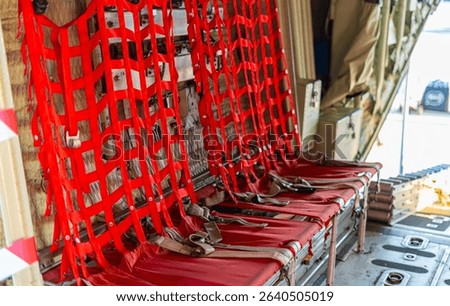Passenger seats in military transport aircraft, military transport aircraft, and air force fighter aircraft. c130