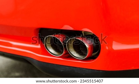Passenger side exhaust tips on a super car
