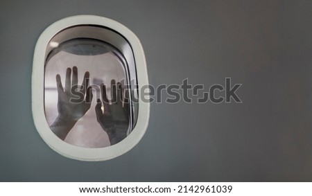 Passenger suffocating and asking for help while stuck inside the airplane after catastrophic accident for plane crash and hijack concept (soft focus)