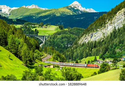 Passenger Train At The Brenner Railway In The Austrian Alps