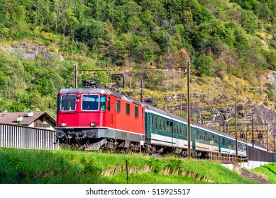 Passenger Train Is Climbing Up The Gotthard Pass. The Traffic Will Be Diverted To The Gotthard Base Tunnel In December 2016.