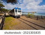 Passenger train of the local railway running along the sea.
Calvi, Corsica, France.