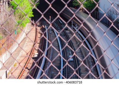 Passenger train moving quickly into underground tunnel