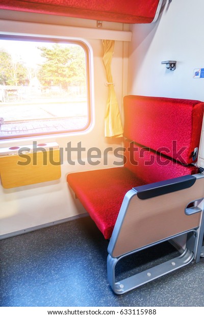 passenger train seat,\
inside the train.