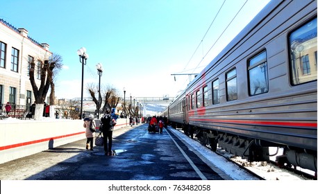 Passenger Train Stops At The Trans Siberian Railway Station